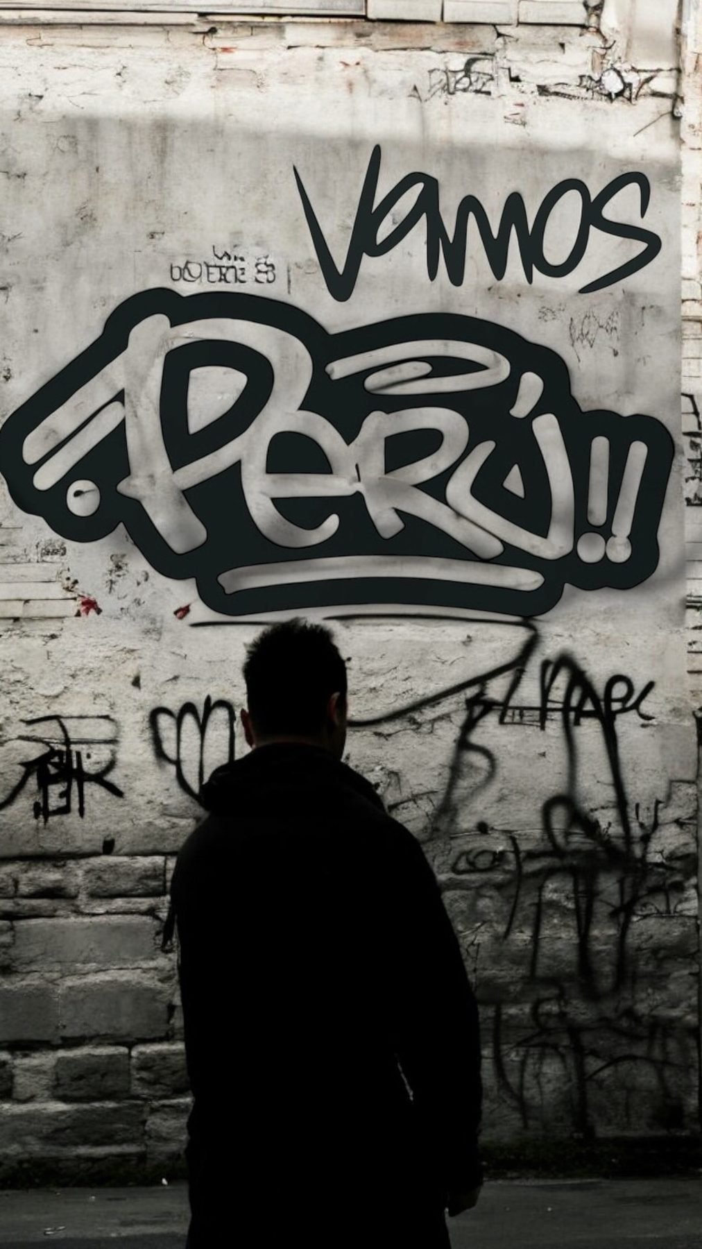Vamos Perú graffiti tag on a wall, silhouette of a man looking at it
