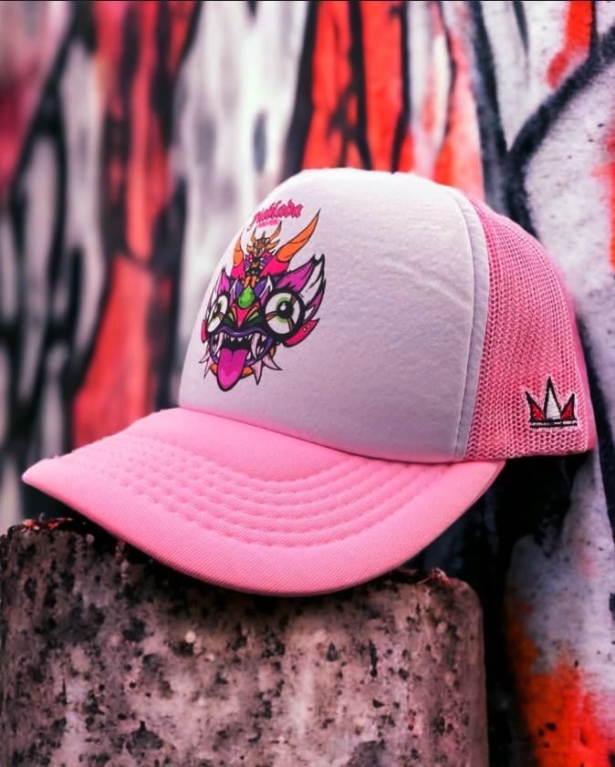 Pink trucker cap with Diablada mask patch